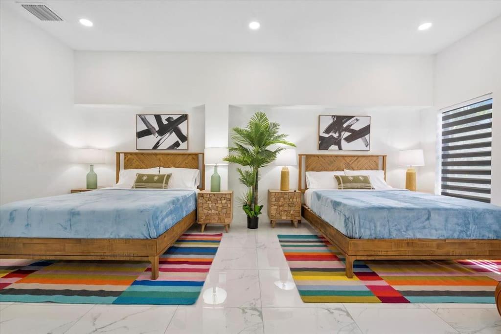 Holiday home Villalee-jungle Palm Island White Marble Pool Area